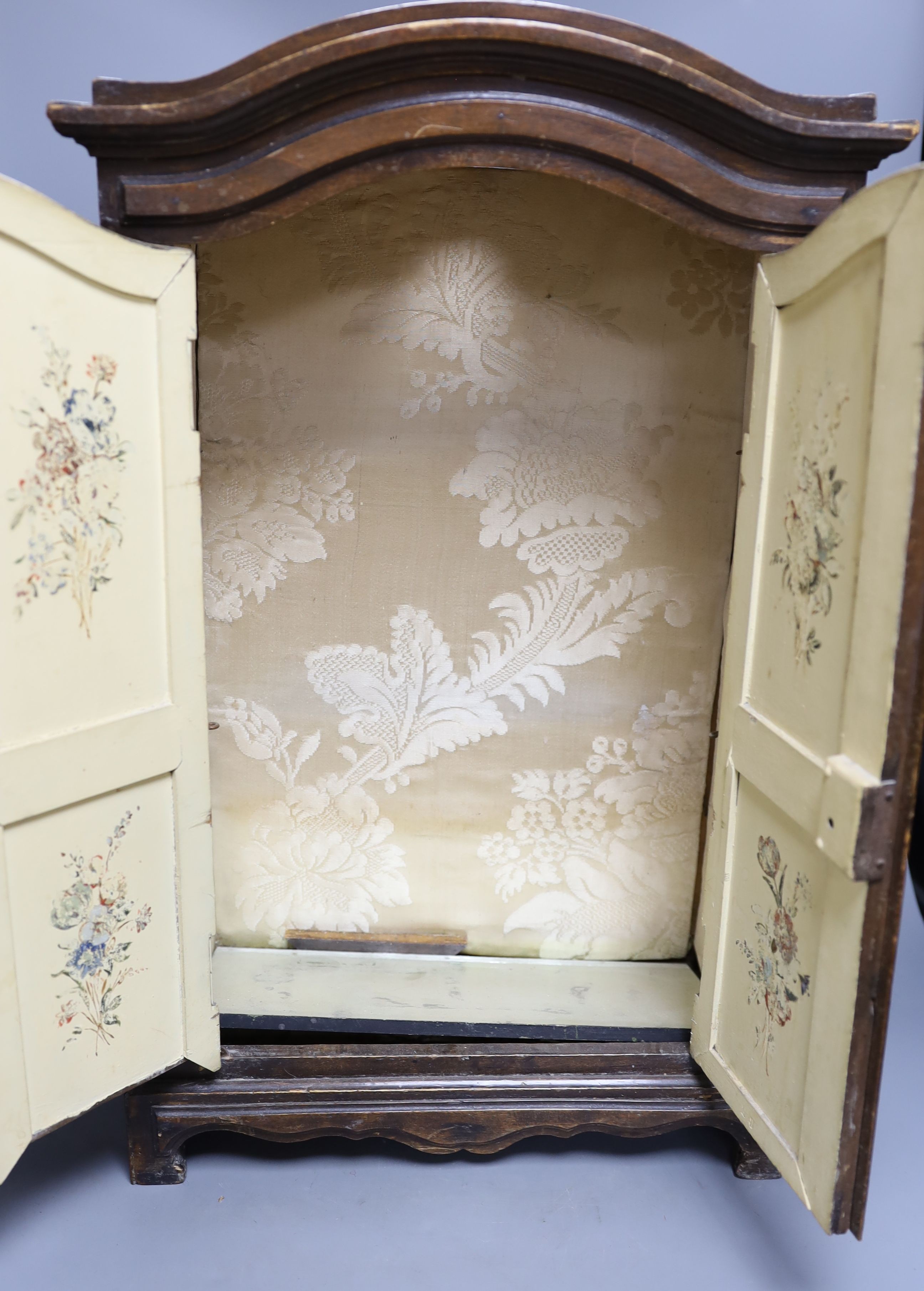 A miniature beech armoire, 57 cms high.